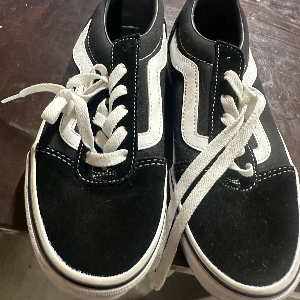 Women’s vans never worn Black and White Sneakers